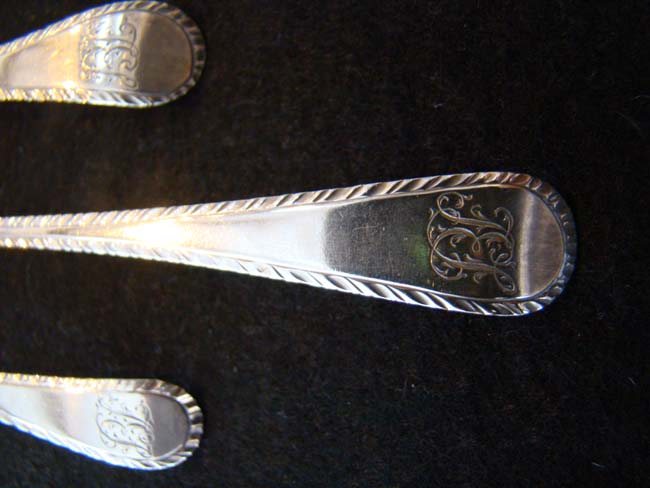 An exceptionally fine and rare set of 12 English 18th century sterling silver teaspoons circa 1775-1785 — image 2